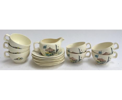 A Midwinter 'Riviera' part teaset, designed by Hugh Casson, comprising seven teacups and saucers, with a milk jug 