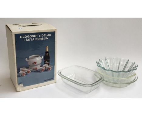 A Swedish ceramic mulled wine set; together with a number of pyrex and glass items, including a glass flower holder 