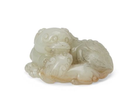 A Chinese pale celadon jade 'lion and cub' groupLate Qing dynasty/Republic periodCarved from a pale celadon stone with cloudy