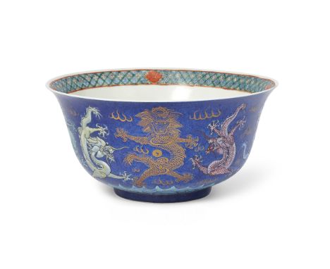 A large Chinese powder blue-ground famille rose 'nine dragon' bowlQing dynasty, 19th century, apocryphal Kangxi six-character
