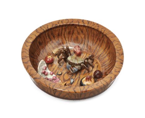 A Chinese faux-bois trompe l'oeil basin20th century, apocryphal Qianlong impressed seal markThickly potted and naturalistical