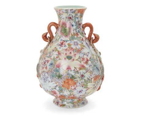 A Chinese famille rose 'hundred flowers' vase with ruyi handlesRepublic period, apocryphal Qianlong six-character markPainted