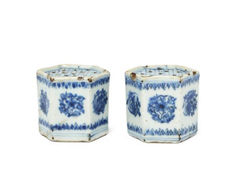 A pair of Chinese hexagonal incense stick holdersMing dynasty, 17th centuryPainted to each side with a flowering leafy stem b