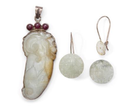 A Chinese pale green jadeite pendant and pair of jadeite earringsRepublic periodThe pendant with silver mount, carved as a bi