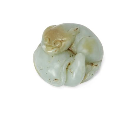 A Chinese celadon jade 'dog and turtle' groupQing dynasty, late 19th/early 20th centuryCarved in a circular form with a dog a