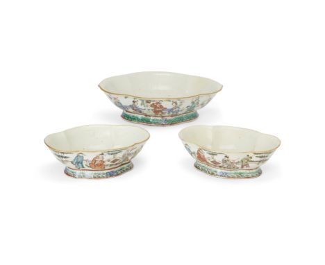 A pair of Chinese famille rose lobed bowls and a similar larger bowlQing dynasty, Tongzhi periodThe pair painted with scholar