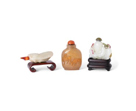 Two Chinese jade and one agate 'silhouette' snuff bottleQing dynasty, 18th/19th centuryComprising: a white jade snuff bottle 