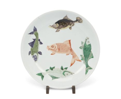 A large Chinese famille verte 'fish' plateQing dynasty, Kangxi mark and of the periodThe rounded sides rising from a short ta