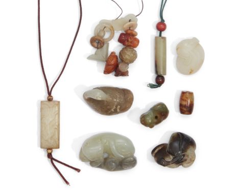 A small group of Chinese jade, hardstone and amber carvingsLate Qing dynasty, 19th/20th centuryComprising: a celadon and grey
