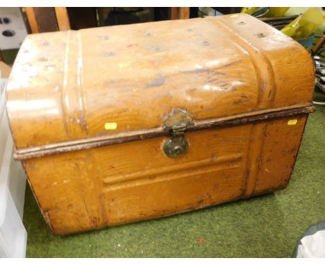 A domed metal trunk, 69cm wide. 