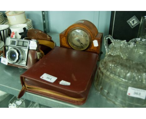 EARLY TWENTIETH CENTURY INLAID WALNUT MANTLE CLOCK, and a GENTLEMAN'S TRAVEL SET IN FITTED LEATHER CASE, (2)