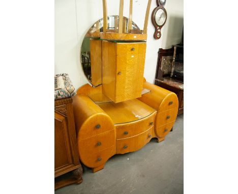 A GOOD QUALITY BIRDSEYE MAPLE ART DECO DRESSING TABLE, WITH OVAL SHAPED PEDESTALS OF THREE DRAWERS AND TWO CENTRAL DRAWERS WI