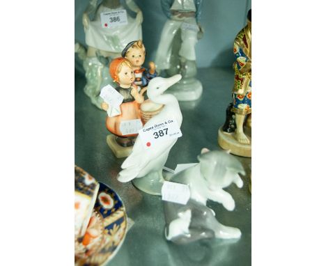 LLADRO MODELS OF A CAT WITH A MOUSE AND OF A GOOSE, AND TWO GOEBEL HUMMEL FIGURINES (4) 