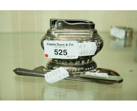 A SMALL SILVER AND CARVED MOTHER O'PEARL BUTTON HOOK; A METAL TOOTHPICK; AN ENAMELLED SOUVENIR SPOON AND A RONSON EP TABLE LI