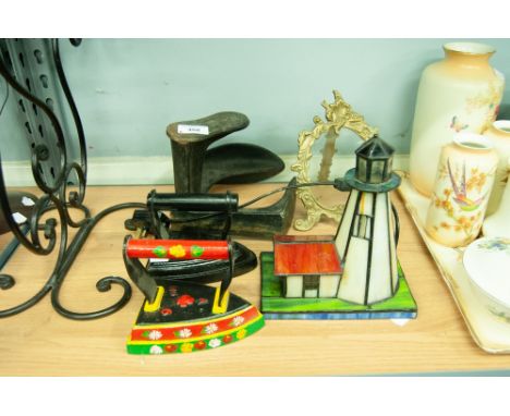 A WROUGHT IRON  STAND, TWO FIRE IRONS, LIGHT HOUSE TABLE LAMP AND A PICTURE FRAME 