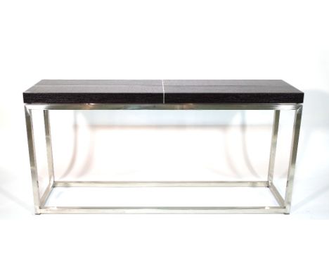 A chrome and ebonised rectangular console table, 160cm wide x 79cm high. 