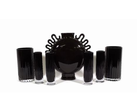 Three pairs of black glass gadrooned vases, the largest 24cm high and a black glazed ceramic moon vase. 