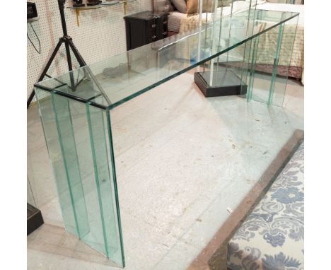 A large plate glass console table, 240cm wide x 90cm high. 