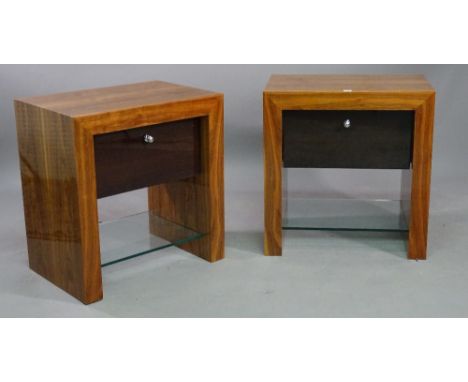 A pair of walnut single drawer bedside tables, with glass shelf undertier, 67cm wide x 70cm high x 45cm deep, (2). 