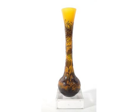 Galle; a 20th century acid etched tall glass vase, decorated with leaves and thistles, 34cm high. 