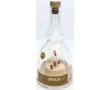 "Bols Ballerina Bottle". Farbloses Glas. Eingebaute Spieluhr mit Ballerina im Zentrum der Flasche. Ehemaliger Inhalt 0,5 L Ap