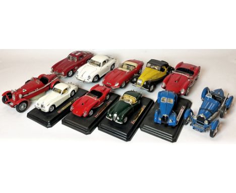 11 Modell-Autos, Burago. Dabei Ferrari, Porsche, Jaguar, etc.