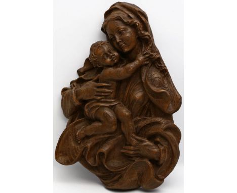 Wandrelief "Madonna mit Kind". Holz, geschnitzt. 20. Jh. H. 36,5 cm.