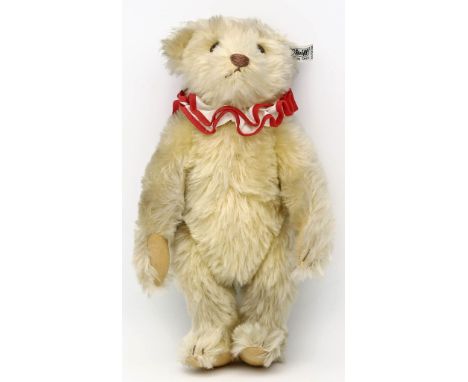 Limitierter Teddy-Clown, Steiff. Weißer Mohair. Mit K und F. Replica aus dem Jahr 1986. Ex. 4937. H. 32 cm.