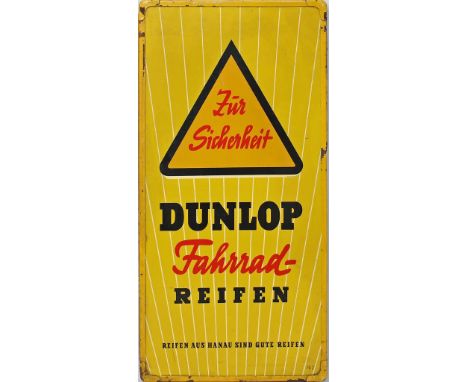 Werbeschild "Zur Sicherheit Dunlop Fahrrad-Reifen". Hartfaser in gelb gelacktem Metallrahmen. Alters- und Gebrauchsspuren. D.