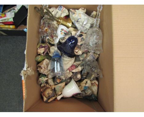 A box containing a quantity of bells including brass nautical, glass, ceramic examples etc 