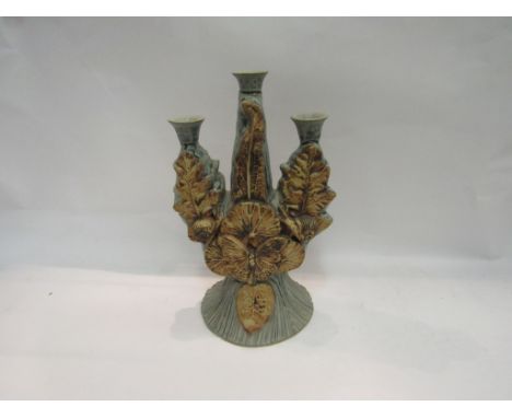 A Bernard Rooke pottery triple arm candlestick holder with butterfly design, 34cm tall 