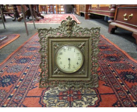 An R &amp; Co Paris easel back clock with ornate pierced border, 24cm x 20cm