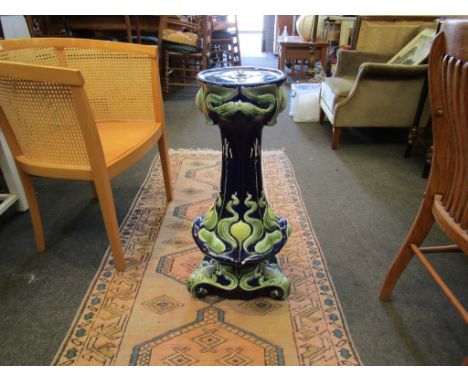 An early 20th Century ceramic Art Nouveau jardiniere stand, 73cm tall