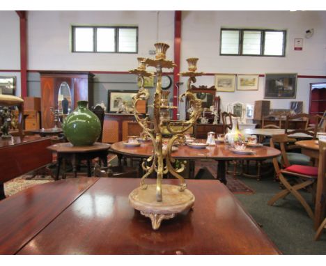 An ornate ormulu and onyx four sconce centre candlestick, 44cm tall