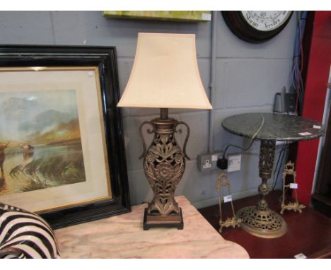 An Oriental style pierced lamp-base, 63cm tall with shade