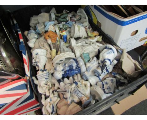 A box containing ceramic and porcelain figures and figural groups including blue and white Continental examples 