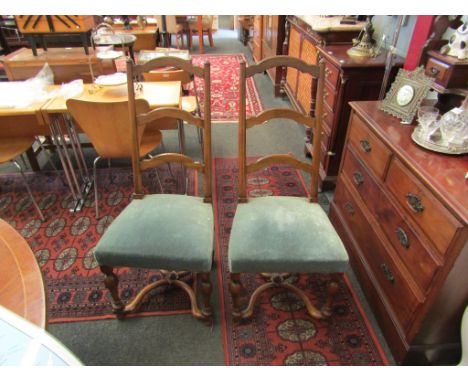 A 19th Century set of six French fruitwood ladder-back dining chairs on turned legs joined by an "X" stretcher with central r