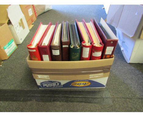 Two boxes of Commonwealth stamp albums including two Stanley Gibbons Worldwide Catalogues (15 + 2)