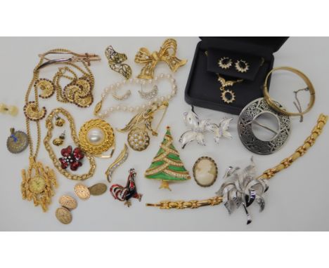 A retro Limit pendant watch, a Christmas tree brooch, a Trifari brooch and other items of vintage costume jewellery Condition