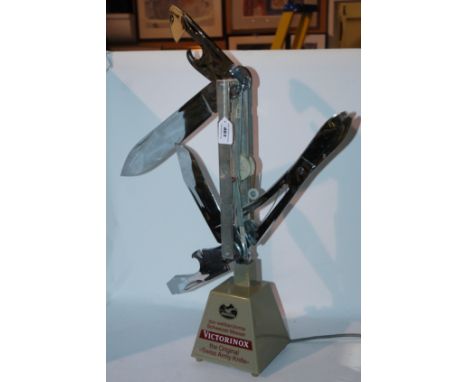 A Victorinox shop display Swiss Army Knife, lack outer case, 61cm high Condition Report: Available upon request