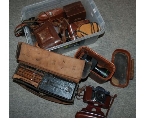 A collection of various vintage cameras, tripods etc Condition Report: Available upon request