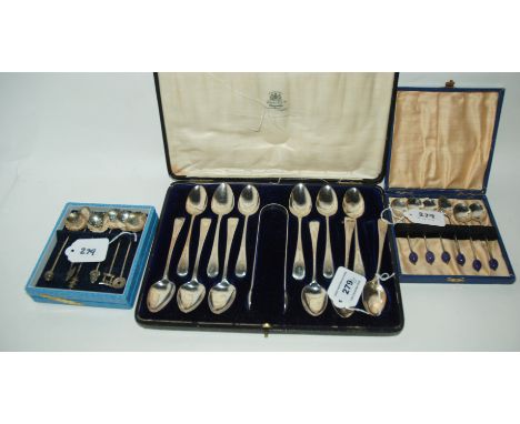 A lot comprising a cased set of twelve silver teaspoons with tongs, a cased set of EP coffee bean spoons and a cased set of s