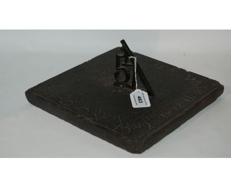 A 19th century slate sundial ,inscribed to I Ingram, dated 1800, 27cm wide Condition Report: Available upon request