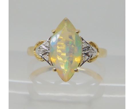 A 9ct gold Ethiopian marquis shaped opal and diamond ring, size O, weight 2.6gms Condition Report: Available upon request