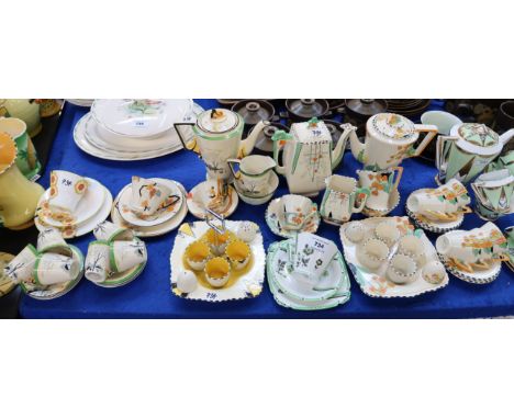 A Burleigh Ware Meadowland coffee set decorated with cowslips, comprising coffee pot, six cups and saucers, milk jug, sugar b