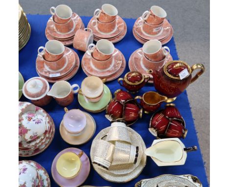 A Villeory and Boch Siena pattern tea/coffee set comprising seven tea cups, six coffee cups, tweleve saucers and plates, milk