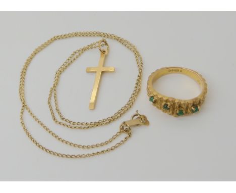 A 9ct retro ring set with green turquoise, dated London 1968, finger size K1/2 and a 9ct cross and chain, weight combined 6.1