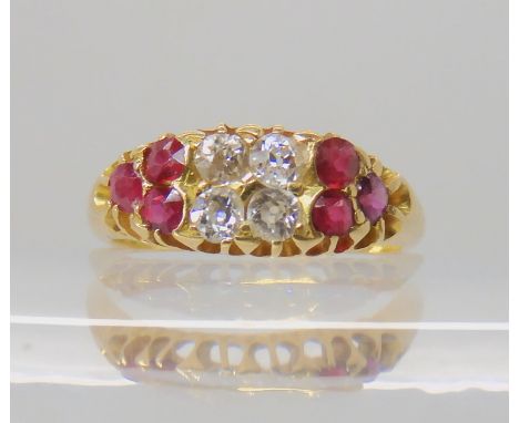 A bright yellow metal ruby and diamond ring, set with estimated approx 0.20cts of old cut diamonds, finger size K, weight 3.2