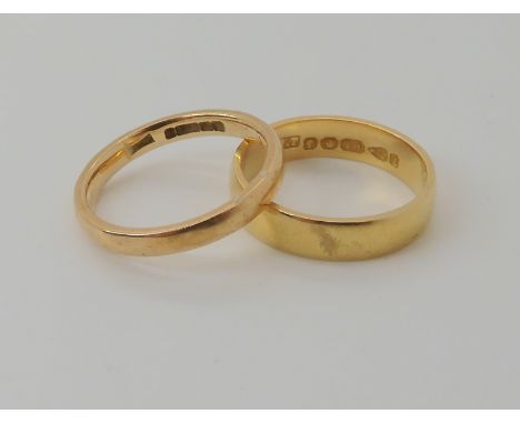 An 18ct gold Victorian wedding ring dated Chester 1882, size L1/2, weight 3.8gms, together with a 9ct wedding ring, size K we