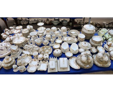 An extensive Noritake Basket of Flowers tea, dinner and coffee service comprising sixteen dinner plates, cups and saucers, fi